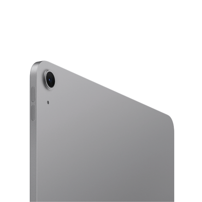 Close-up of the back corner of a silver tablet showing the camera lens, side buttons, and part of the screen edge on a white background.