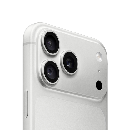 Close-up of the back of a silver smartphone showing a large triple-camera system and flash on a clean white background.